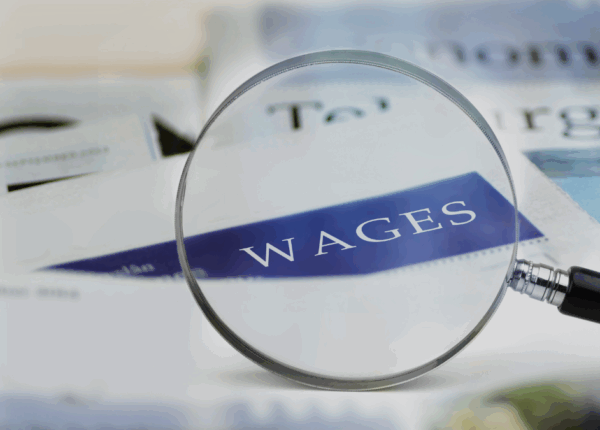 wages-mignifying-glass
