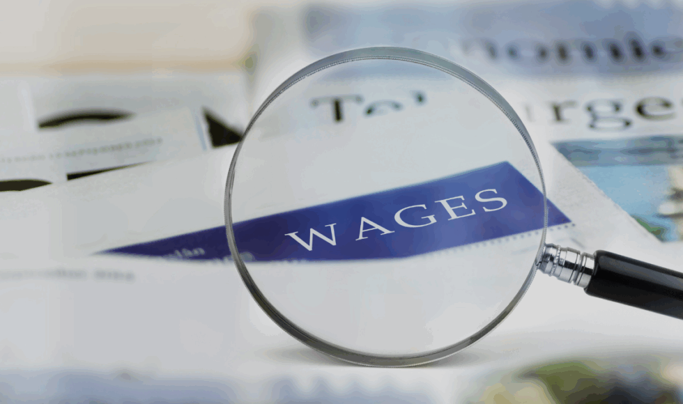 wages-mignifying-glass